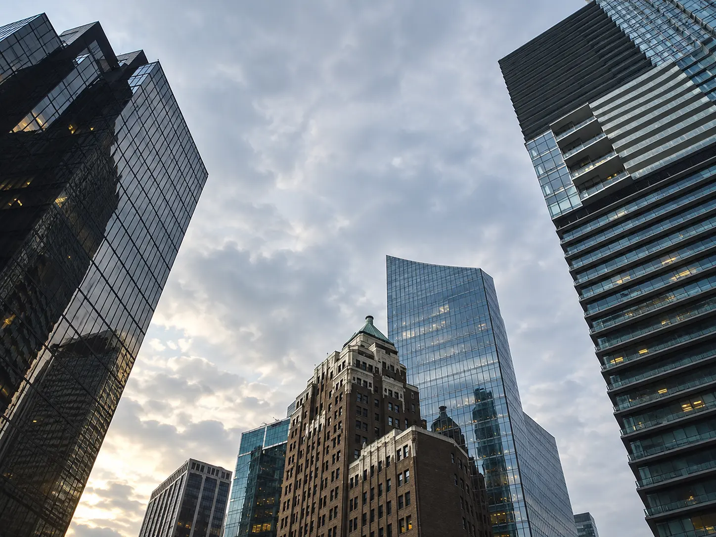 Downtown Vancouver office towers under overcast West Coast light